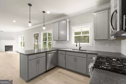 Kitchen - 4290 Brookhaven Dr SE, Covington, GA 30014 photo 4 of 4