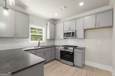 Kitchen - 4290 Brookhaven Dr SE, Covington, GA 30014 photo 2 of 4