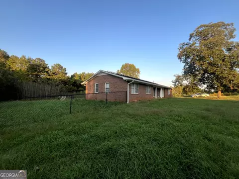 Exterior - 8750 Sandy Cross Rd, Carnesville, GA 30521 photo 4 of 11