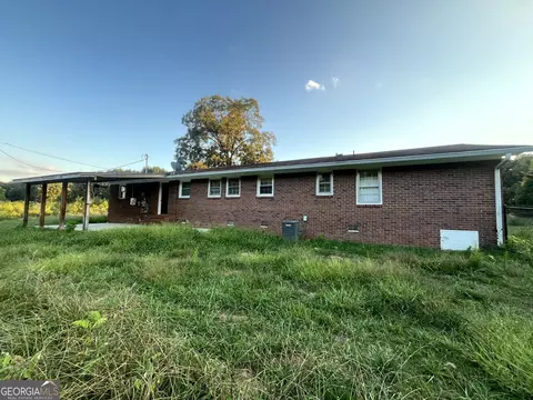 Exterior - 8750 Sandy Cross Rd, Carnesville, GA 30521 photo 6 of 11
