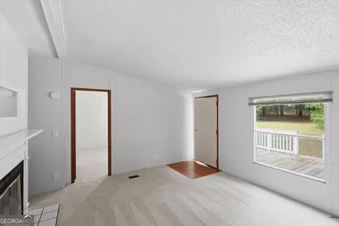 Living - 312 Blounts Chapel Rd, Haddock, GA 31033 photo 3 of 3