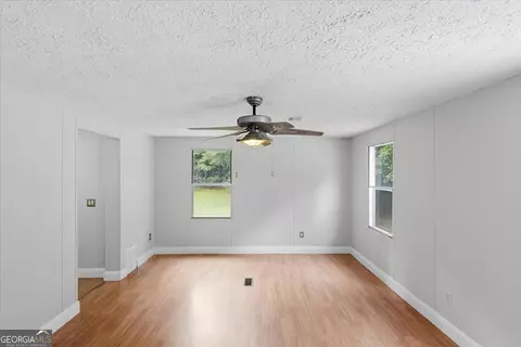 Living - 308 Blounts Chapel Rd, Haddock, GA 31033 photo 6 of 6