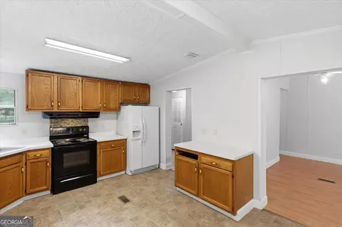 Kitchen - 308 Blounts Chapel Rd, Haddock, GA 31033 photo 2 of 4