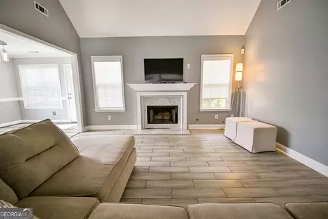 Living - 101 Bridgemill Dr, Hampton, GA 30228 photo 4 of 7