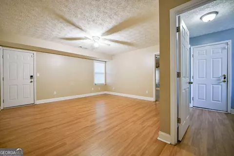 Living - 101 Bridgemill Dr, Hampton, GA 30228 photo 6 of 7