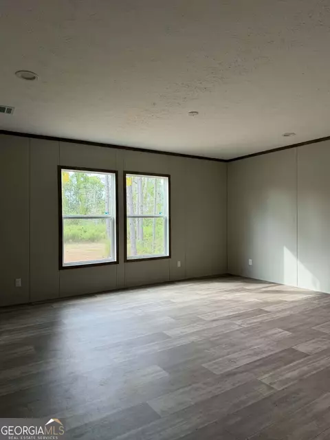 Living - 1509 E 4th St Ext, Alma, GA 31510 photo 4 of 4