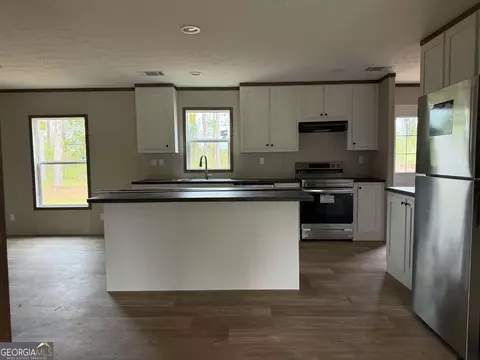 Kitchen - 1509 E 4th St Ext, Alma, GA 31510 photo 1 of 1