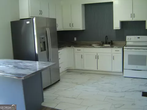 Kitchen - 1703 E 3rd Ct, Lanett, AL 36863 photo 1 of 7