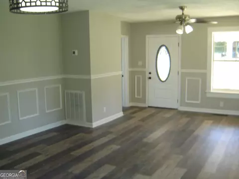 Living - 1703 E 3rd Ct, Lanett, AL 36863 photo 7 of 9
