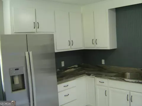 Kitchen - 1703 E 3rd Ct, Lanett, AL 36863 photo 6 of 7