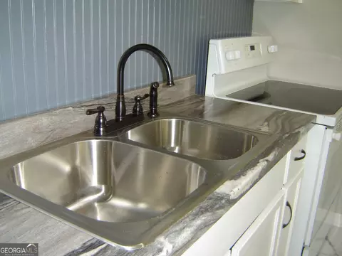 Kitchen - 1703 E 3rd Ct, Lanett, AL 36863 photo 7 of 7