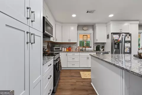 Kitchen - 108 Bar None Rd, Forsyth, GA 31029 photo 5 of 7