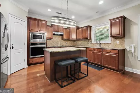 Kitchen - 313 Snow Bird Dr, Hampton, GA 30228 photo 2 of 2