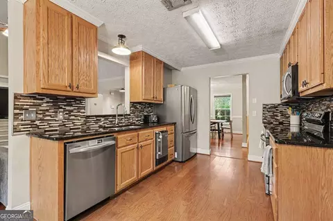 Kitchen - 50 Trelawney Ln, Covington, GA 30016 photo 3 of 4