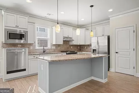 Kitchen - 2965 Thistle Trl, Suwanee, GA 30024 photo 2 of 2