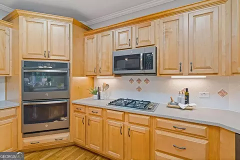 Kitchen - 210 Rivergate Dr, Suwanee, GA 30024 photo 2 of 3