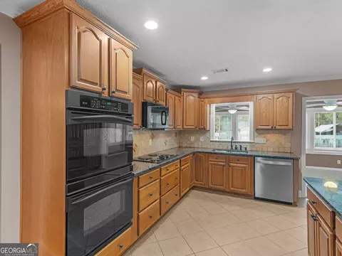 Kitchen - 720 Kirkland Rd, Covington, GA 30016 photo 5 of 8
