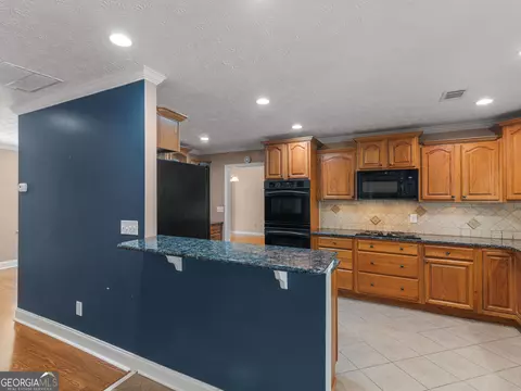 Kitchen - 720 Kirkland Rd, Covington, GA 30016 photo 8 of 8
