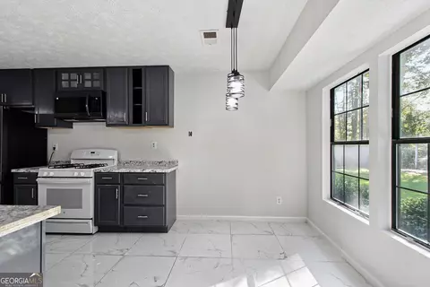 Kitchen - 5683 Cape Cod Ln, Lithonia, GA 30038 photo 2 of 3