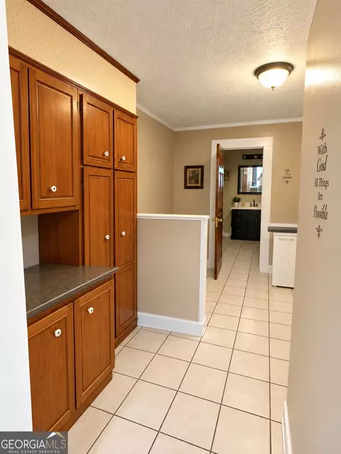 Entry Way - 142 E Broad St, Uvalda, GA 30473 photo 2 of 6