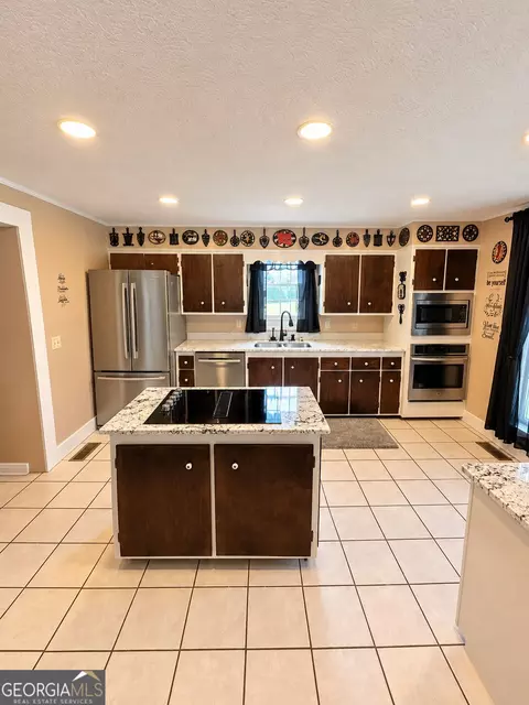 Kitchen - 142 E Broad St, Uvalda, GA 30473 photo 1 of 2