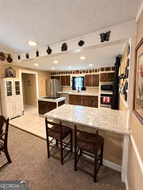 Kitchen - 142 E Broad St, Uvalda, GA 30473 photo 2 of 2