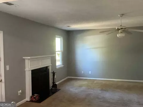 Living - 1026 Misty Meadows Pt, Hampton, GA 30228 photo 3 of 6