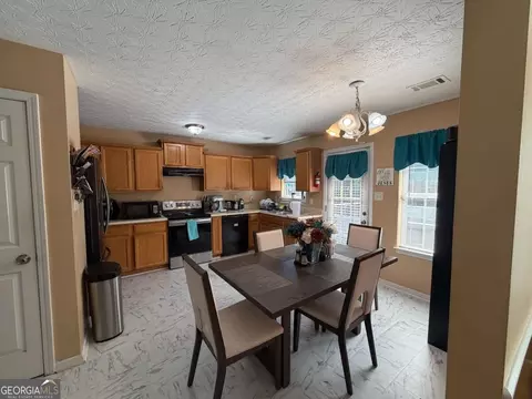 Kitchen - 35 Pembroke Pl, Covington, GA 30016 photo 2 of 2
