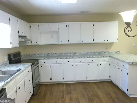 Kitchen - 7658 Old River Rd S, Brooklet, GA 30415 photo 2 of 2