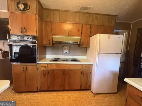 Kitchen - 936 W Mcrae St, Mount Vernon, GA 30445 photo 2 of 2