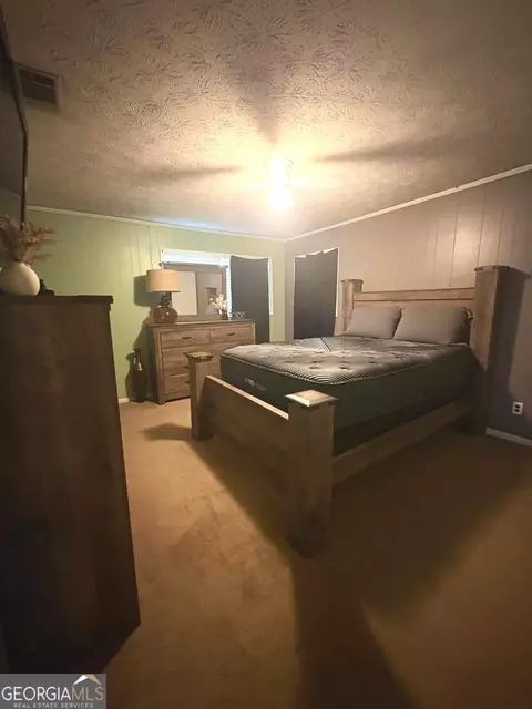 Bedroom - 936 W Mcrae St, Mount Vernon, GA 30445 photo 3 of 4