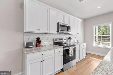 Kitchen - 129 E 5th St, Monroe, GA 30655 photo 2 of 5