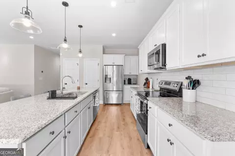 Kitchen - 129 E 5th St, Monroe, GA 30655 photo 4 of 5