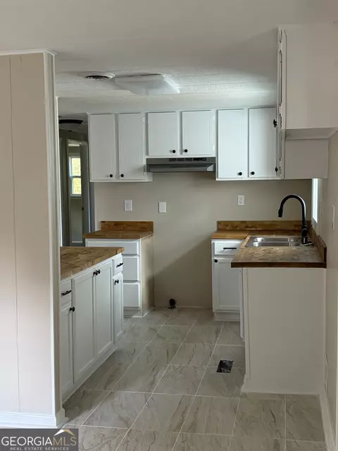 Kitchen - 64 Darden Rd, Lagrange, GA 30240 photo 2 of 4
