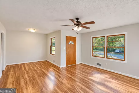 Living - 5282 David Cir SE, Covington, GA 30014 photo 1 of 7