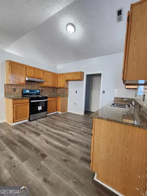 5927 Farmbrook Ln, Rex, GA 30273 photo 8