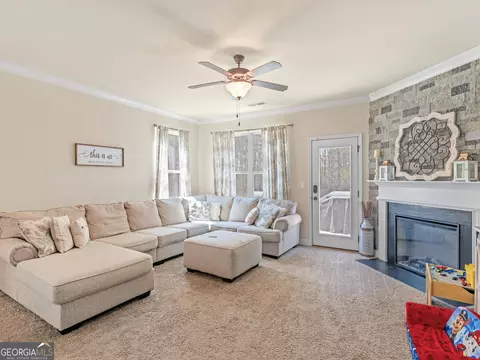 Living - 1421 Stone Ridge Ct, Hampton, GA 30228 photo 1 of 3