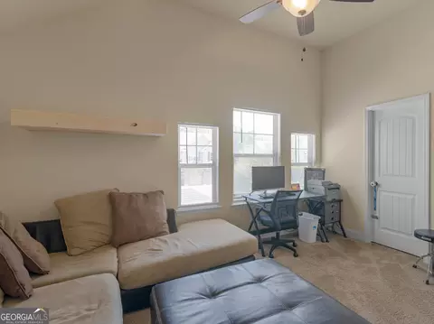 Living - 1421 Stone Ridge Ct, Hampton, GA 30228 photo 3 of 3