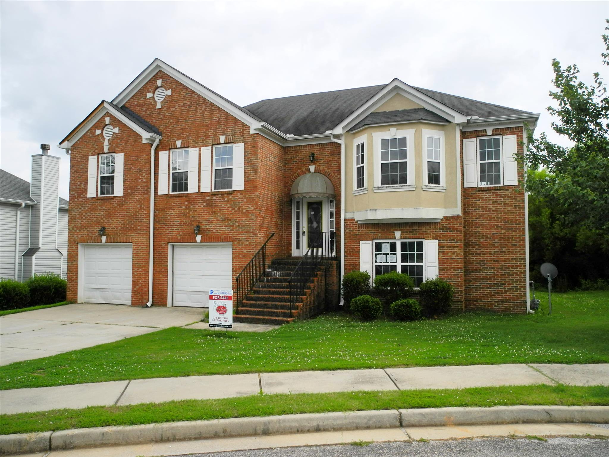 6785 Oakleigh Trl, Rex, GA 30273 photo 1