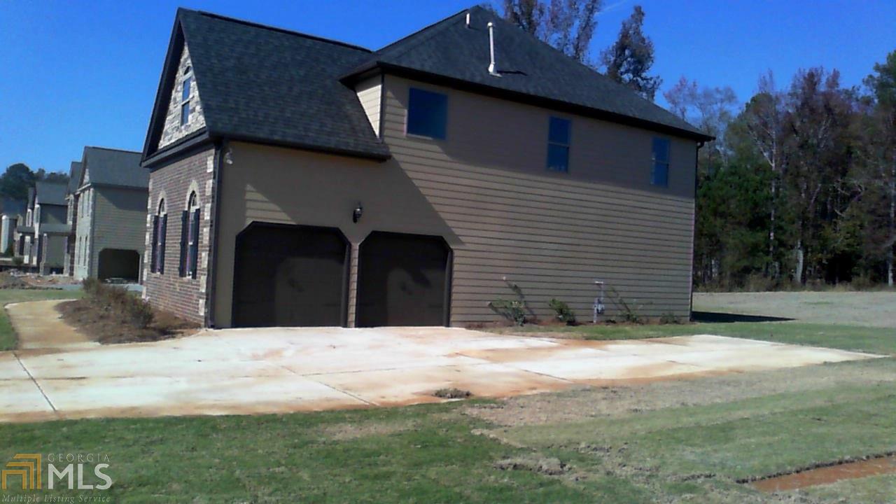 242 Traditions Ln, Hampton, GA 30228 photo 26