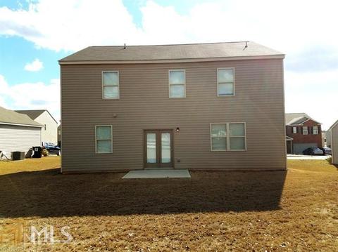 2306 Sawgrass Dr, Hampton, GA 30228 photo 4