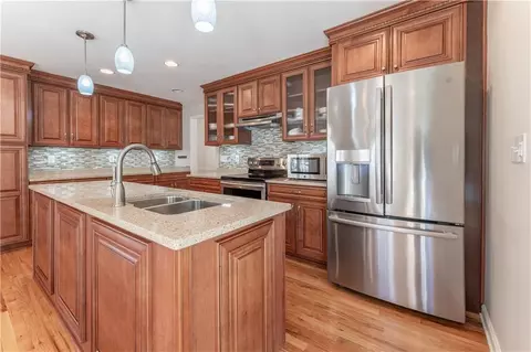 Kitchen - 404 Spring Pl, Monroe, GA 30655 photo 2 of 5