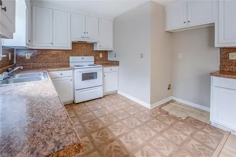 Kitchen - 697 Rocky Point Rd, Covington, GA 30014 photo 4 of 6