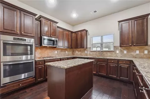 Kitchen - 209 Traditions Ln, Hampton, GA 30228 photo 4 of 7