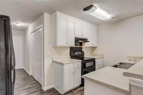 Kitchen - 50 Joy Cir, Covington, GA 30016 photo 2 of 3