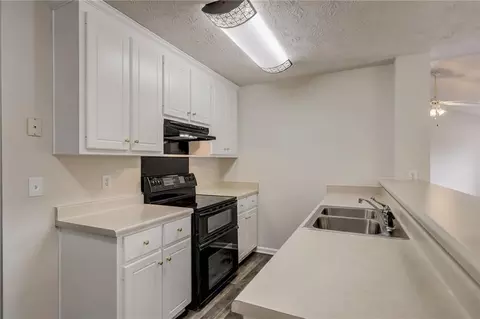 Kitchen - 50 Joy Cir, Covington, GA 30016 photo 3 of 3