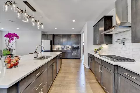 Kitchen - 662 Faraday Cir, Suwanee, GA 30024 photo 3 of 8