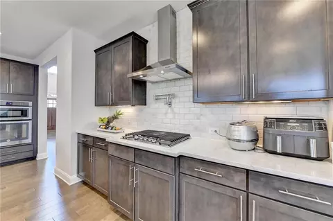 Kitchen - 662 Faraday Cir, Suwanee, GA 30024 photo 4 of 8