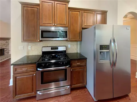 Kitchen - 1415 Turnbridge Walk, Hampton, GA 30228 photo 3 of 3