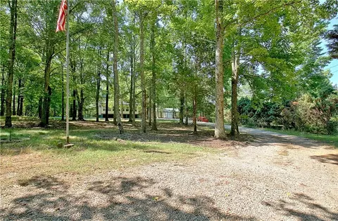 Exterior - 303 Rocky Creek Rd, Hampton, GA 30228 photo 5 of 31
